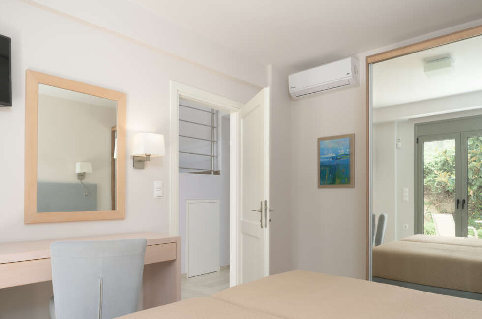 The twin bedroom is bright and airy.