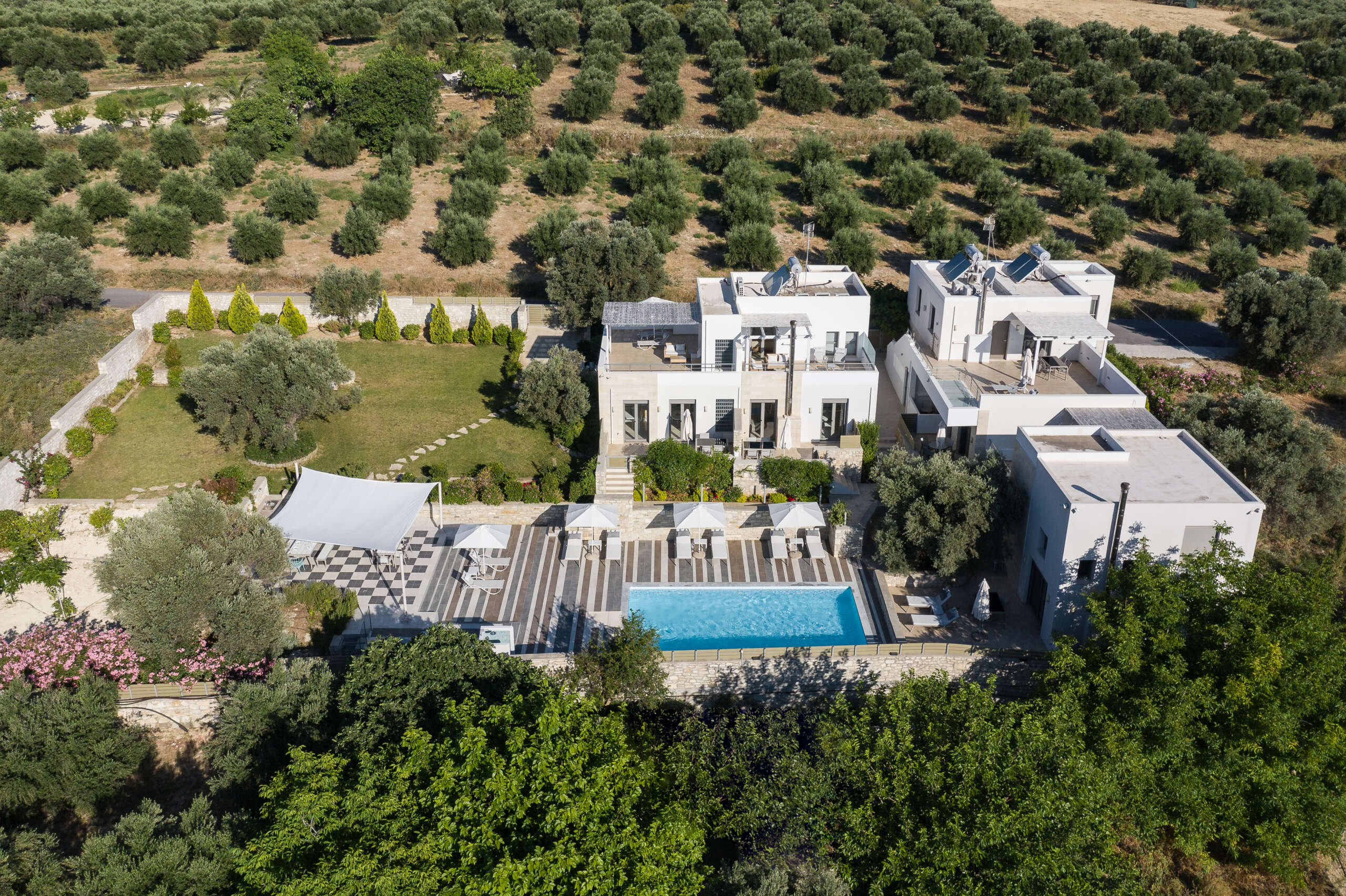 A modern Cretan hideaway complete with beautiful gardens.